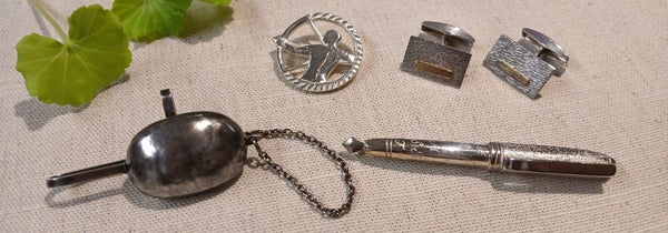 Solmionpitimet, kalvosinnapit ja rintakorut